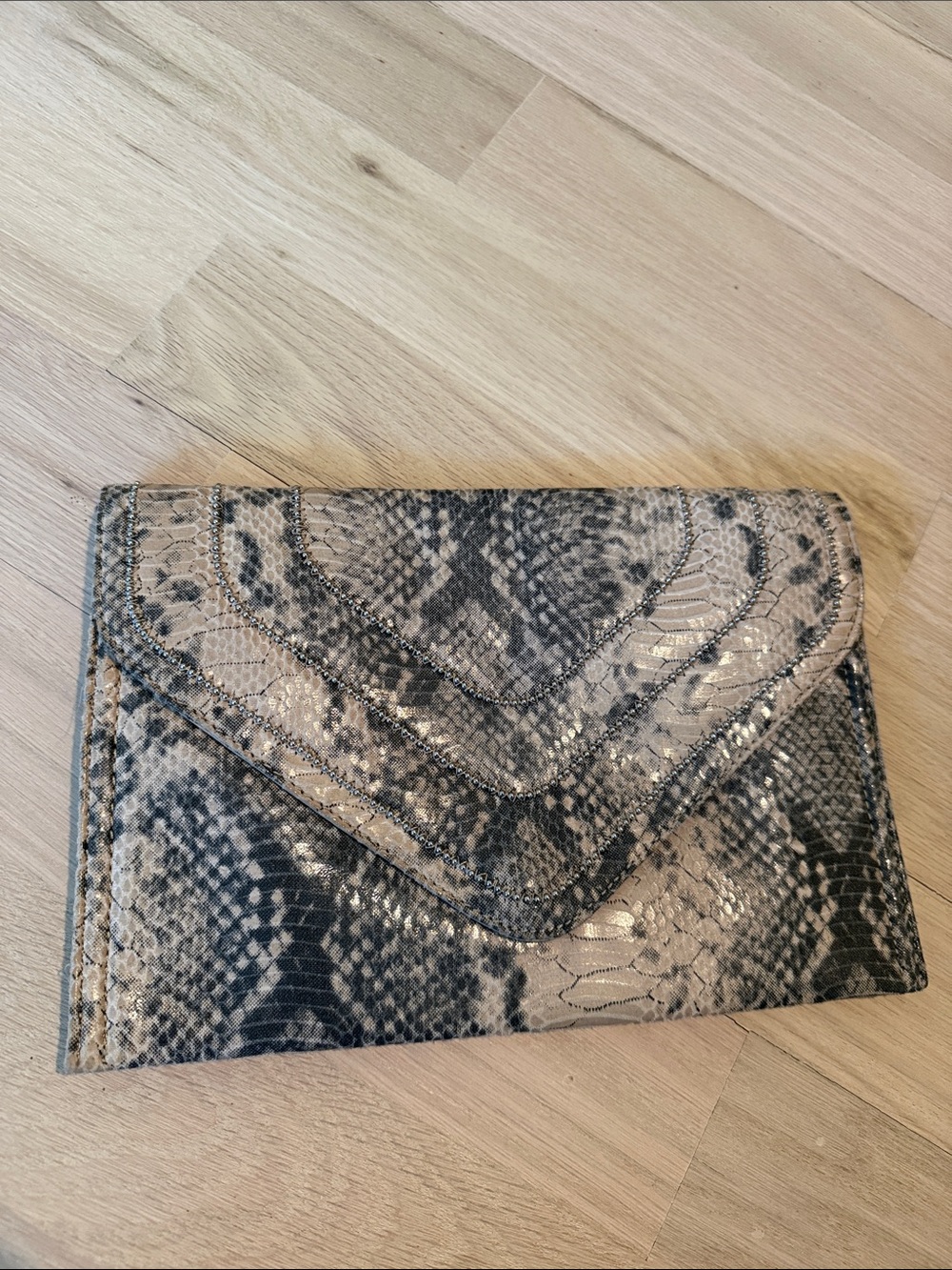 Jennifer Lopez Beige and Black Snake-Print Envelope Clutch